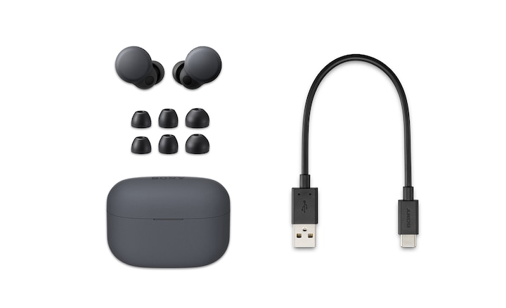 Imagen del estuche gris con los LinkBuds S, 3 pares adicionales de extremos de tapones y un cable de carga USB-C